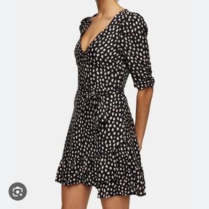 Black and cream wrap dress